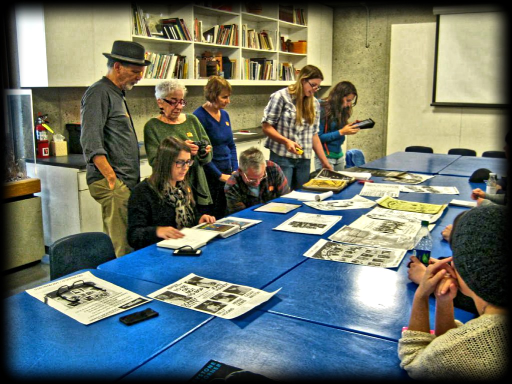 public history students look over archival materials for the Keystone exhibit