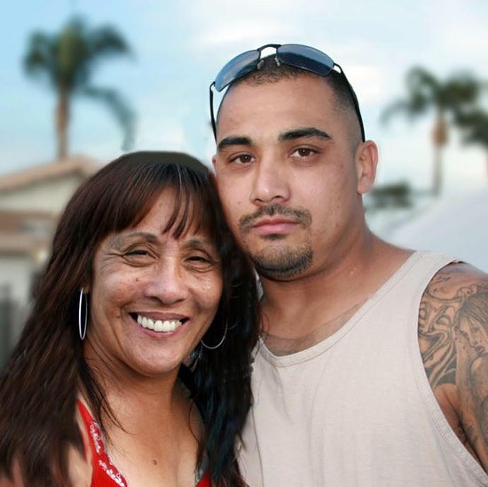 Theresa Smith smiling with son Caesar Cruz