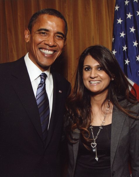 Anila Ali stands with President Obama and American flag