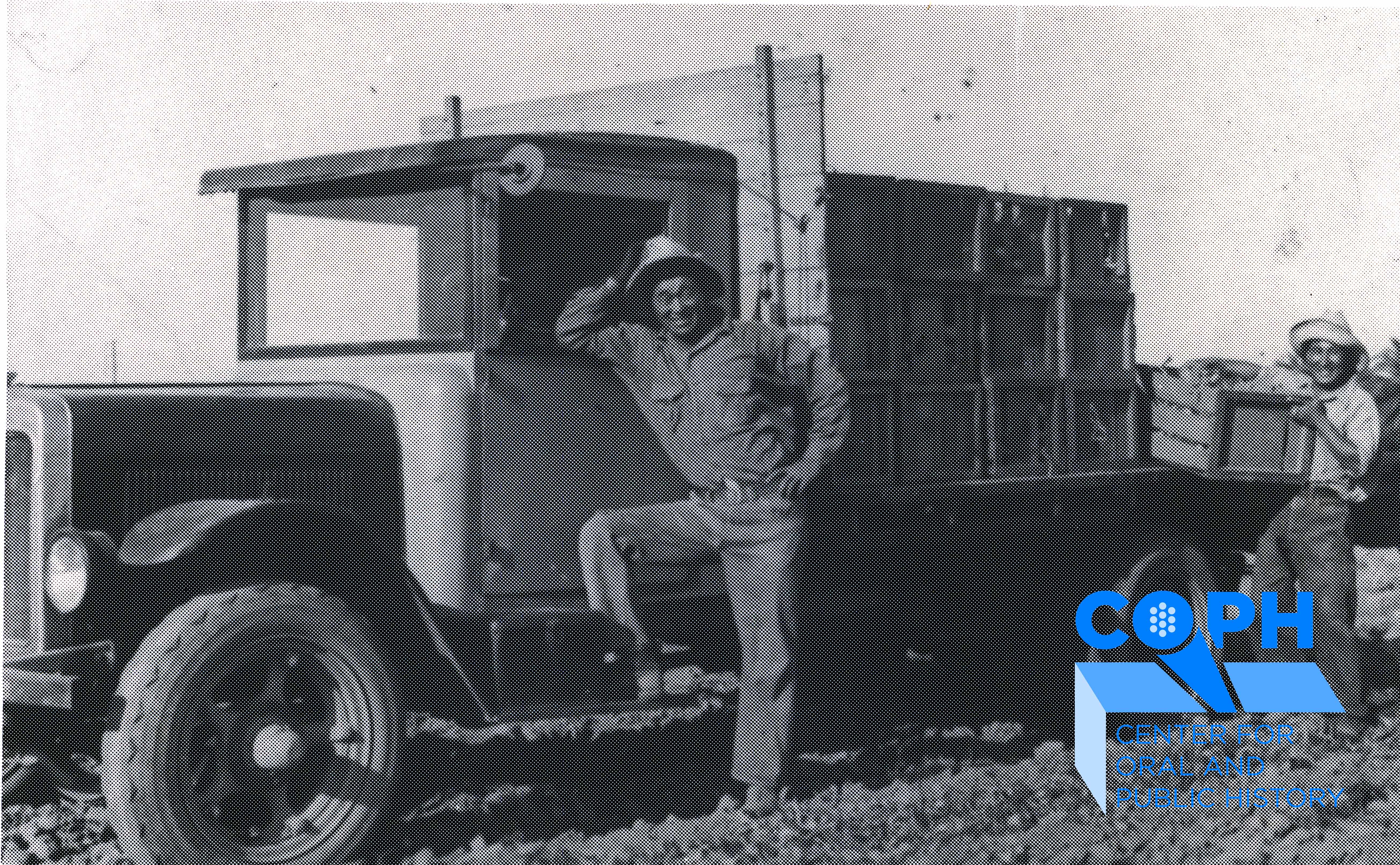 Clarence Nishizu stands in front of truck 