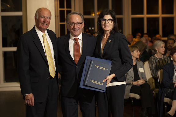 Dick Ackerman, Joe Dunn, and Natalie Fousekis inside the Summit House restaurant