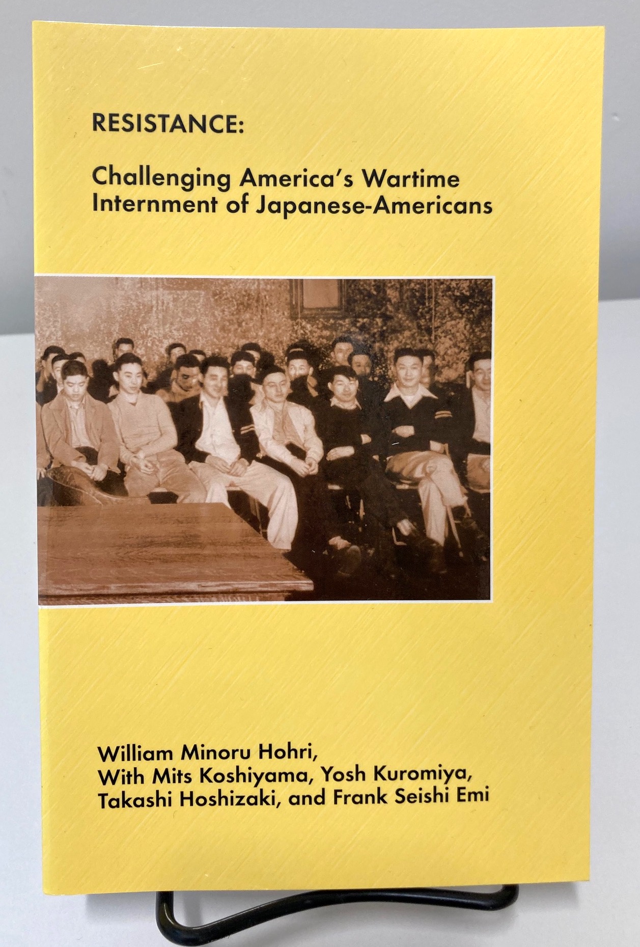 Resistance book cover with group photo of Japanese American men
